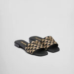 Prada embroidered slides